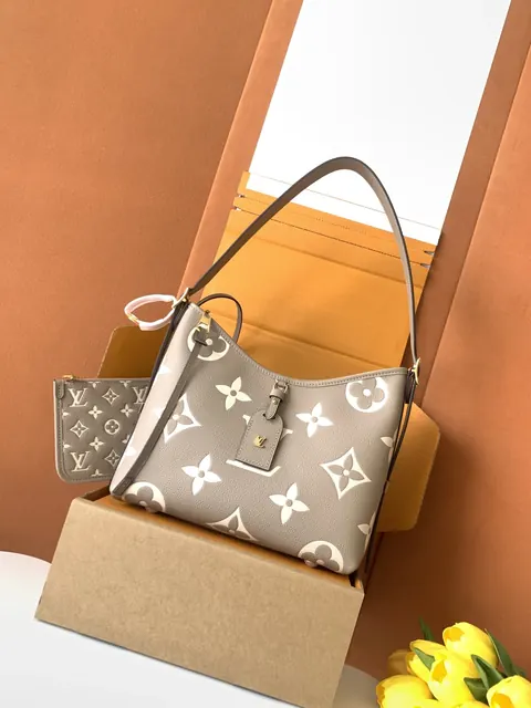 Luxury-style tote bag reference showing shape, handles, tag, hardware, and printed pattern